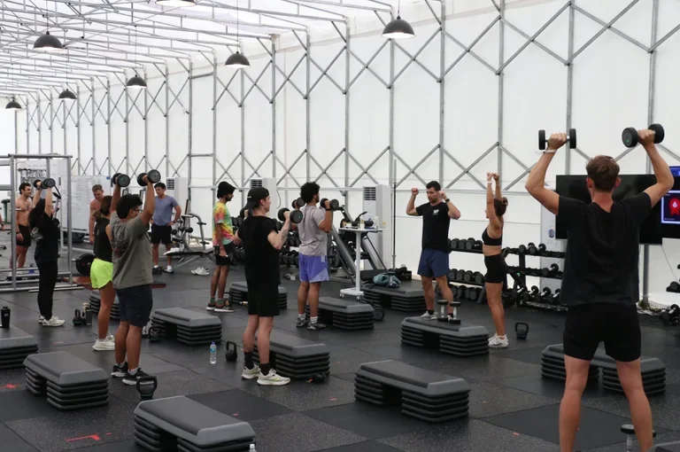 Network School members exercising together in a fitness class