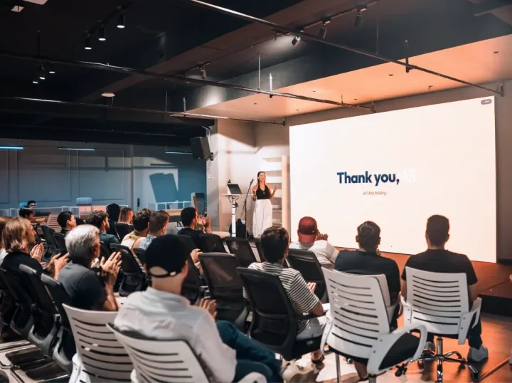 A workshop with a speaker and attendees at Network School